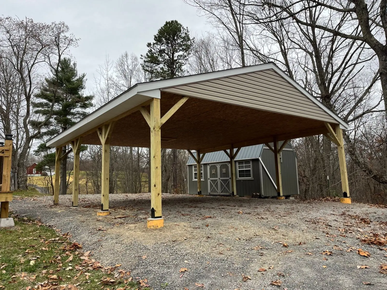 Custom carport with timber frame construction