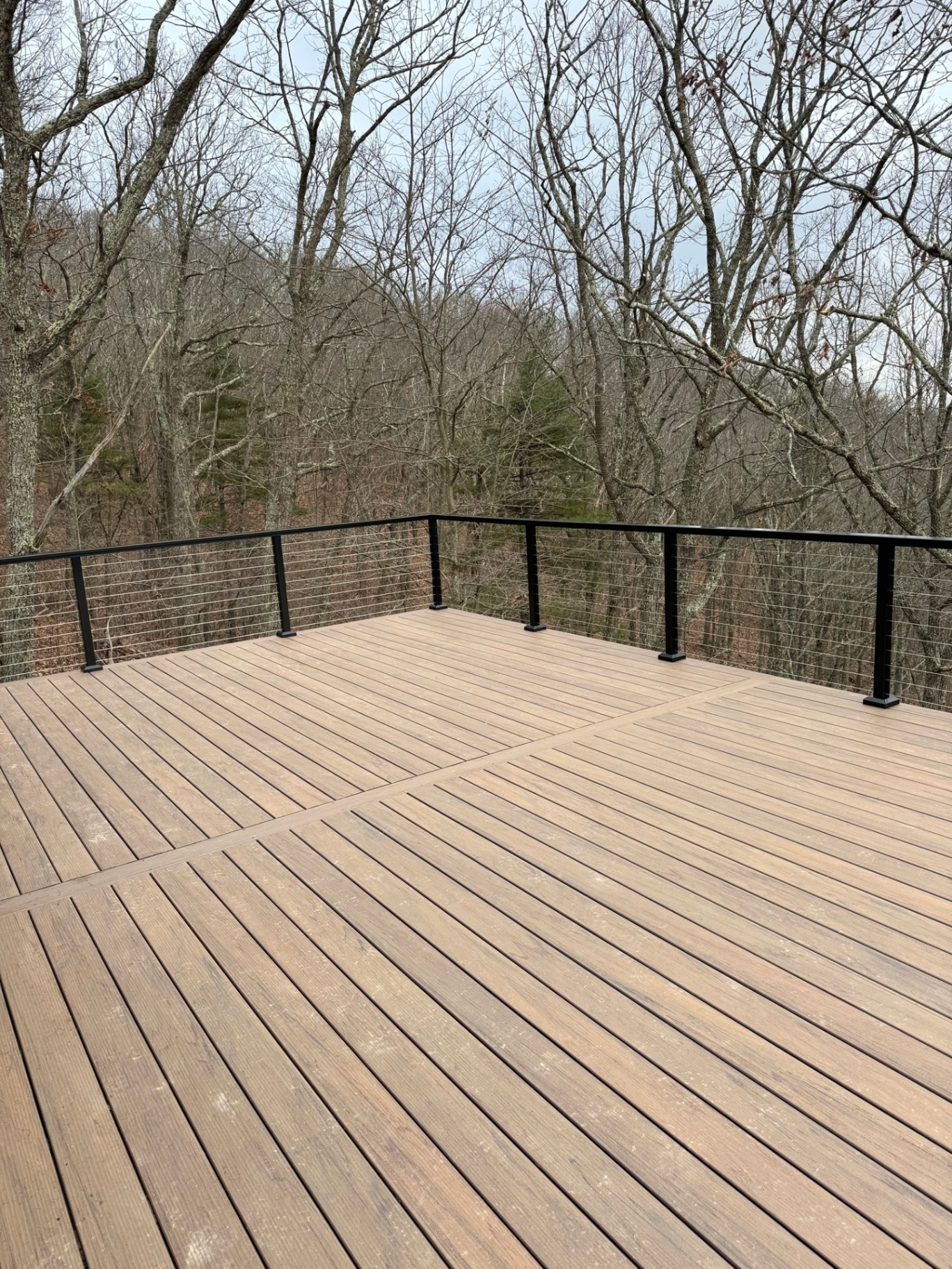 Composite deck with cable railing and mountain view