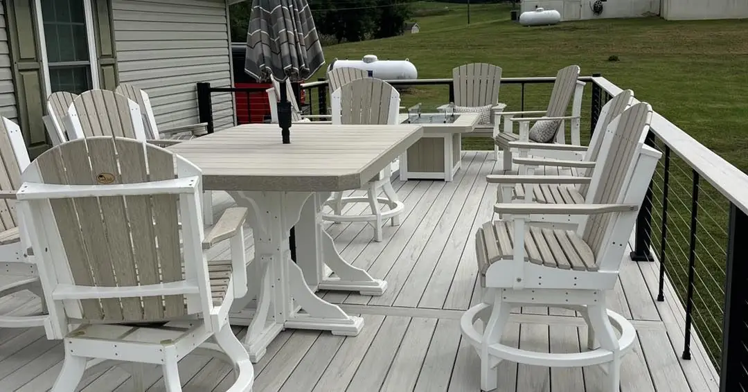 Outdoor dining deck with Adirondack chairs
