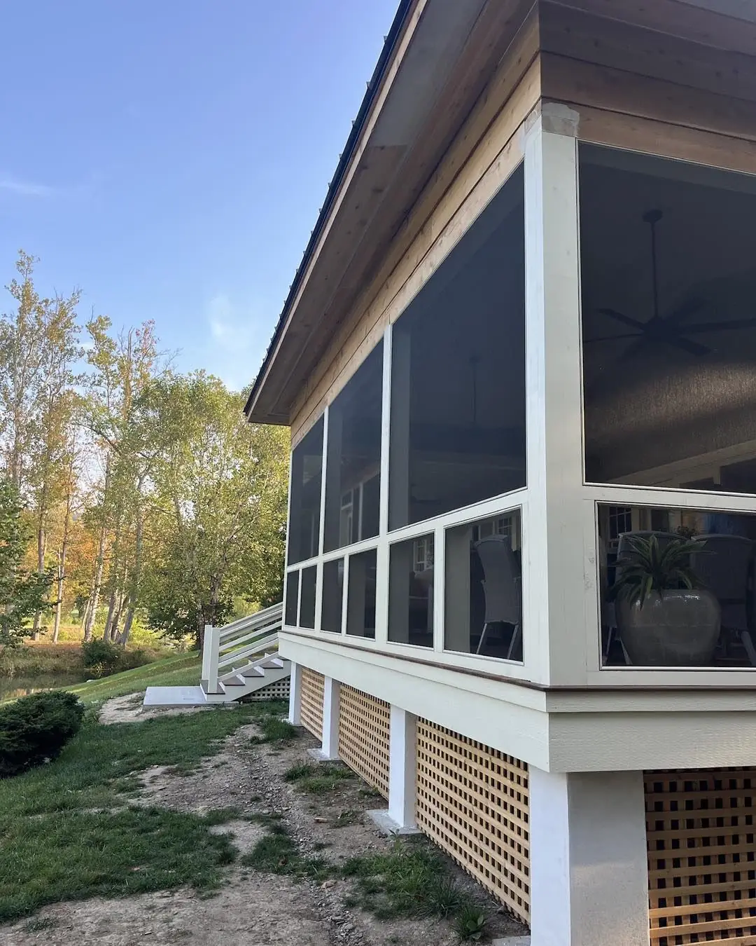 Screened porch with lattice skirting
