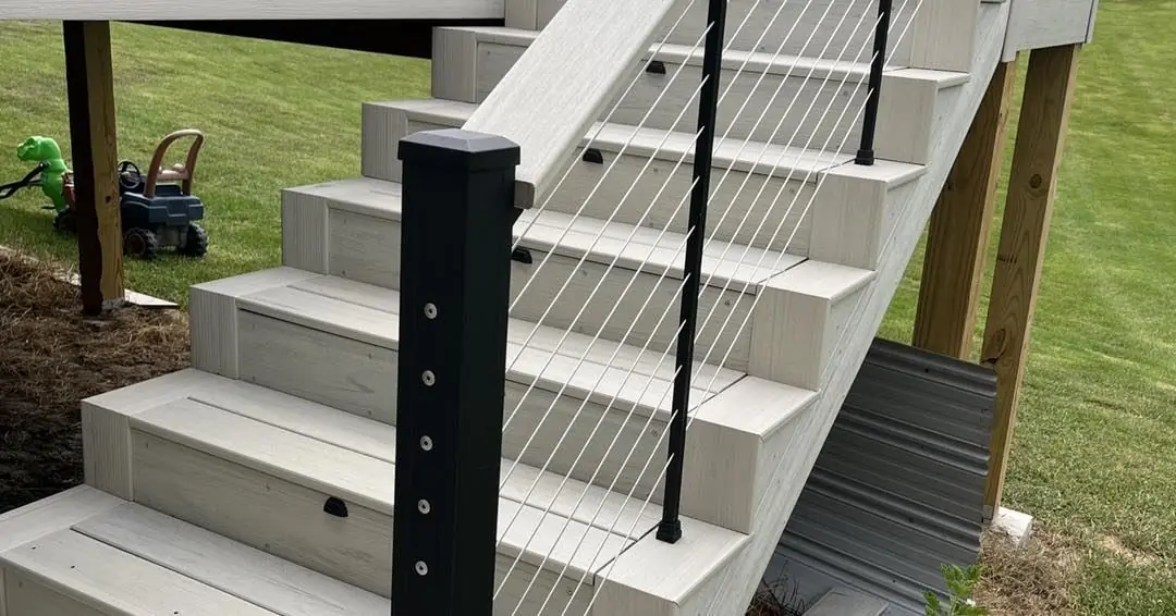 Composite deck stairs with cable railing