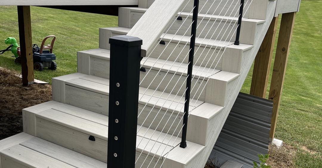 Composite deck stairs with cable railing