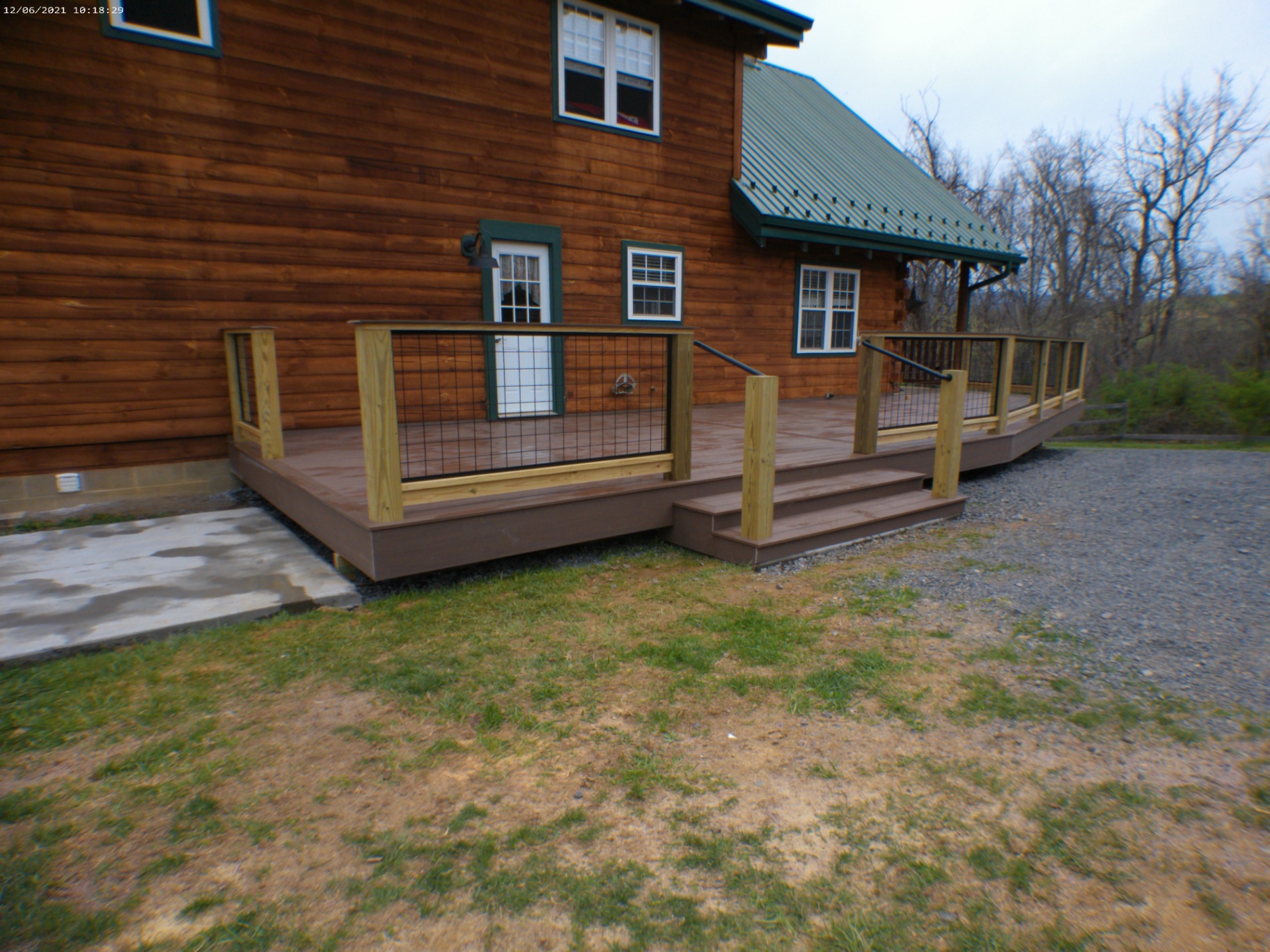 Wraparound deck on log home